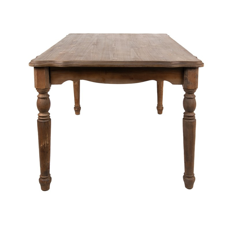 Brązowy drewniany stół w stylu rustykalnym