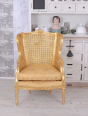 Złoty fotel ażurowy z dekoracyjną poduchą Ludwik XVI