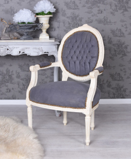 Szary fotel tapicerowany z podłokietnikami Ludwik XVI