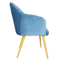 Niebieskie tapicerowane krzesło retro na złotych nogach